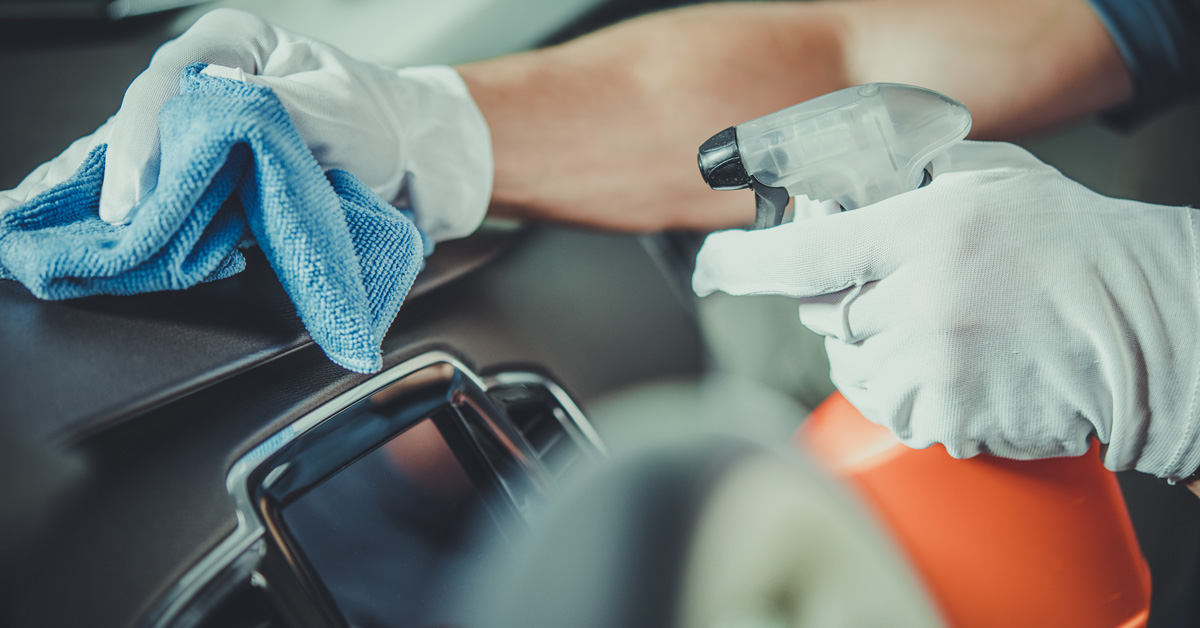 Person Cleaning the Inside of a Car
