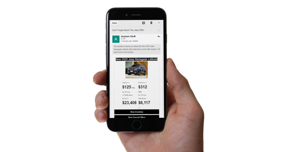 200914.1_-_Email_Campaign_Dealer_Teamwork_phone_hand_1200x628 Person viewing MPOP email campaign on a phone